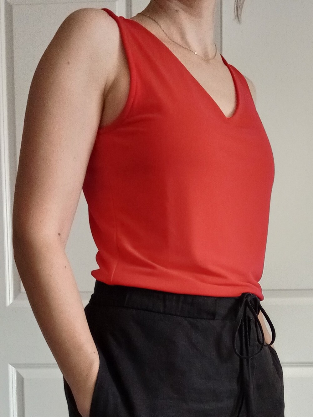 Cleo Women’s Red V-Neck Sleeveless Top